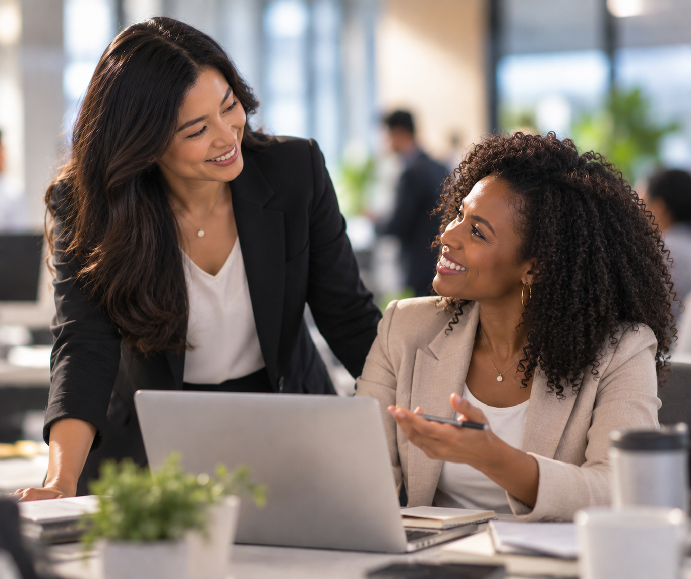 Professionals discussing business immigration options